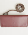 Front view of horizontal full-grain leather crossbody bag and matching shoulder strap in Espresso Brown, showing handmade stitching and embossed logo. Markore Gul Sahar.
