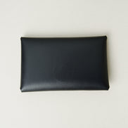 Back view of full grain leather envelope style wallet in midnight black. Markore Niva Seal.